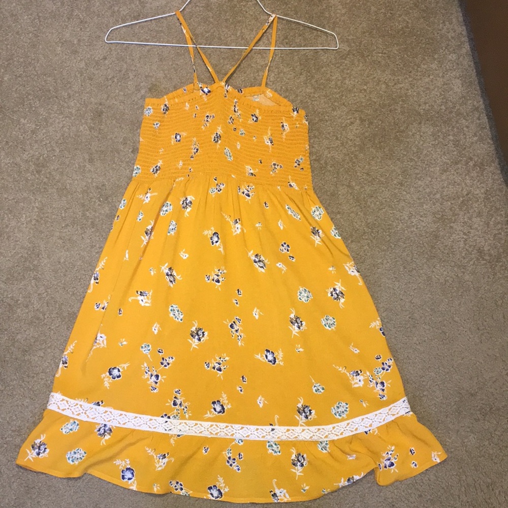 yellow dress with flowers and lace details